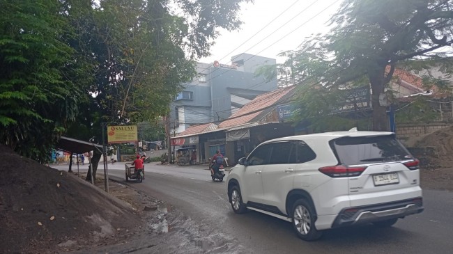 Tanah murah 800 m2 Pinggir Jalan Raya Kalimulya Depok